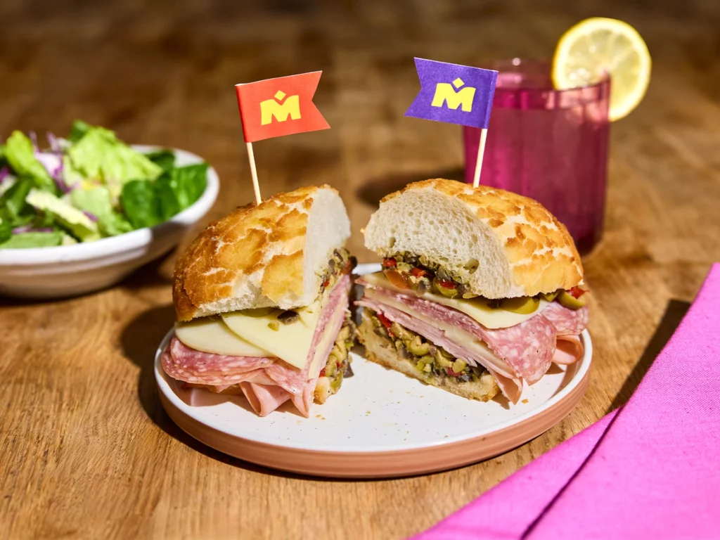 Recipe photo of Muffuletta Sando Sandwich on a plate.